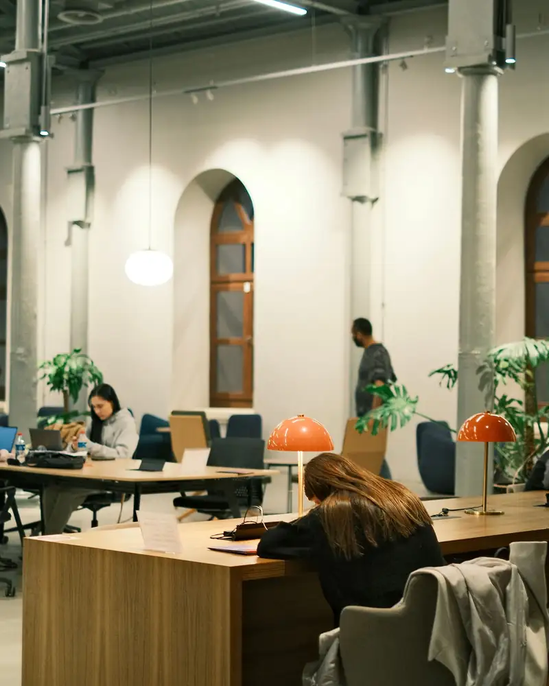 Employees working in a clean, well-maintained office