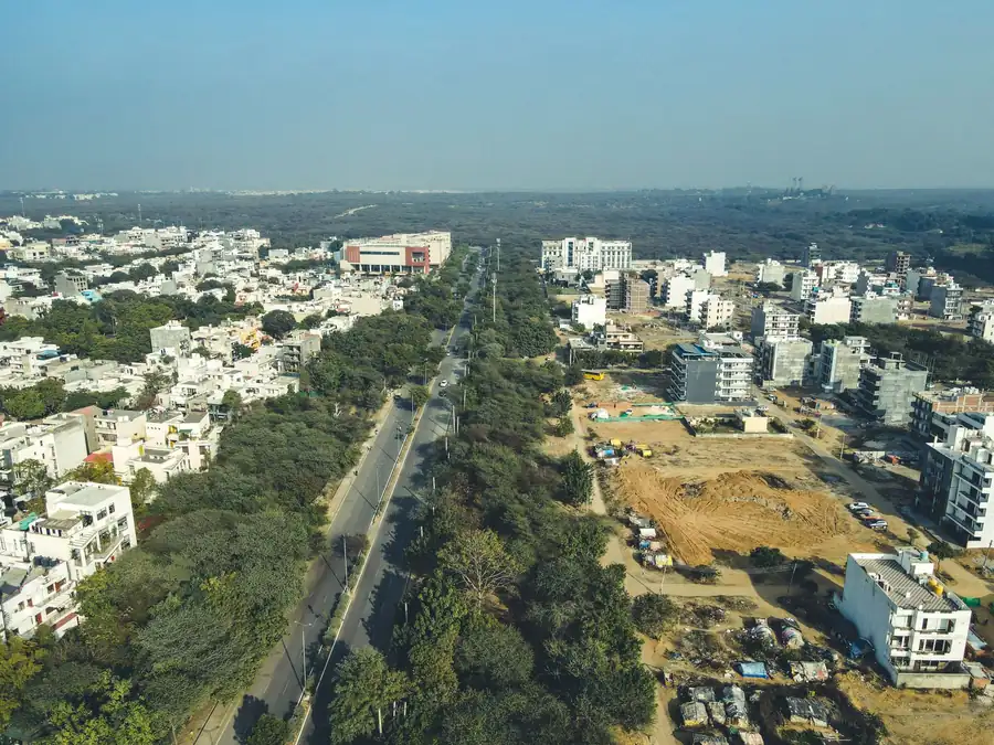 Aerial view of Gurugram showing roads, offices and business zones