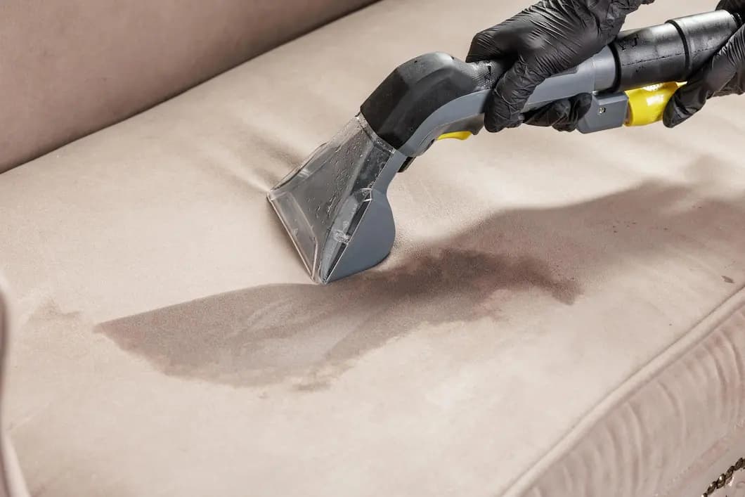 industrial vacuum extractor cleaning sofa