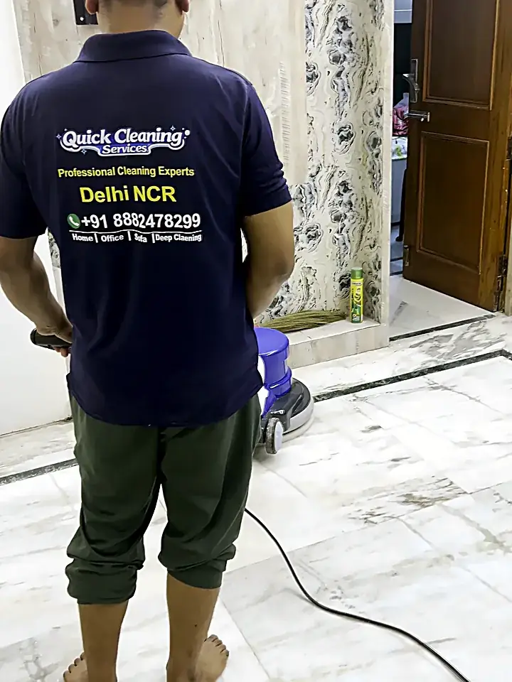 Quick Cleaning Services team running a rotary scrubber over a marble floor in Delhi