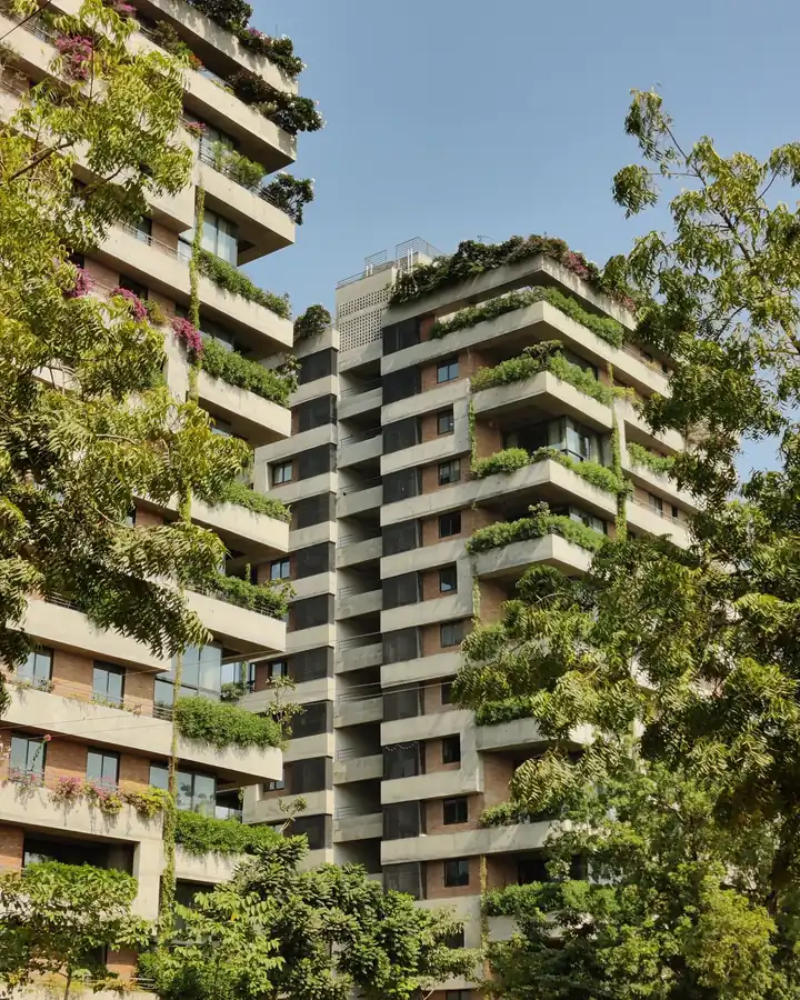 High-rise residential apartment building with balconies, typical of Ghaziabad housing societies