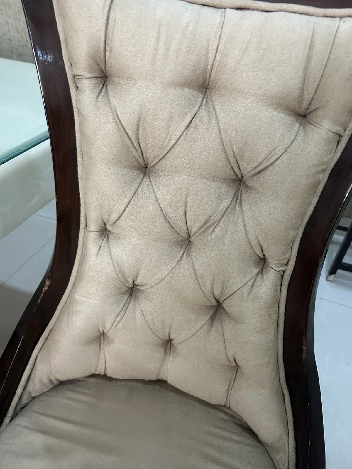 Close-up of upholstered chair fabric after professional deep cleaning in Delhi — clean fibres and no stains